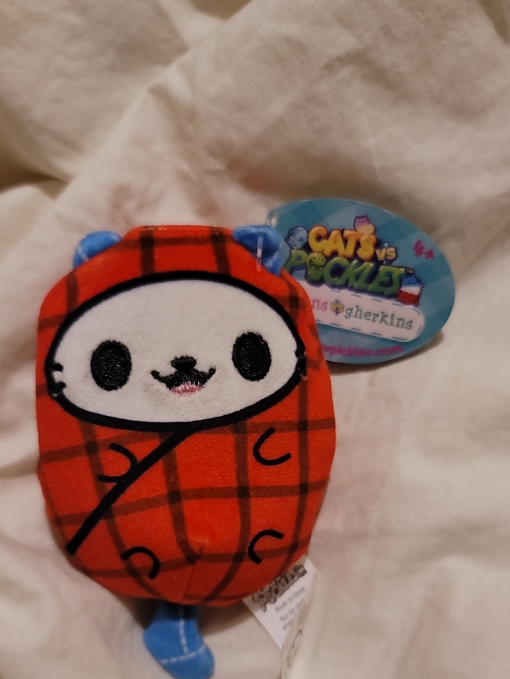 Cats vs Pickles "Kittens vs Gherkins" plush toy, likely the "Lumber Cat" #48